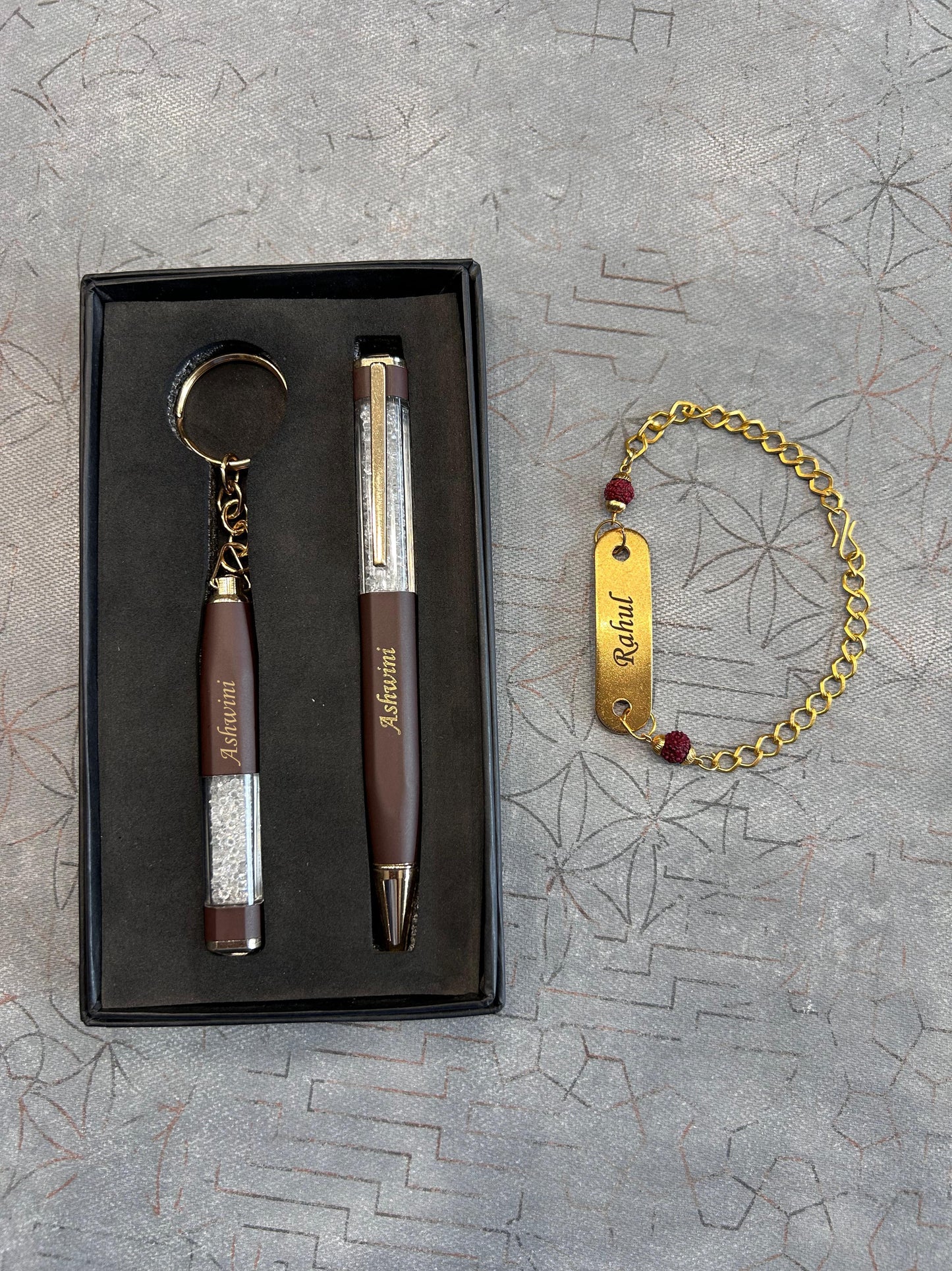 Pen, keychain and rakhi combo